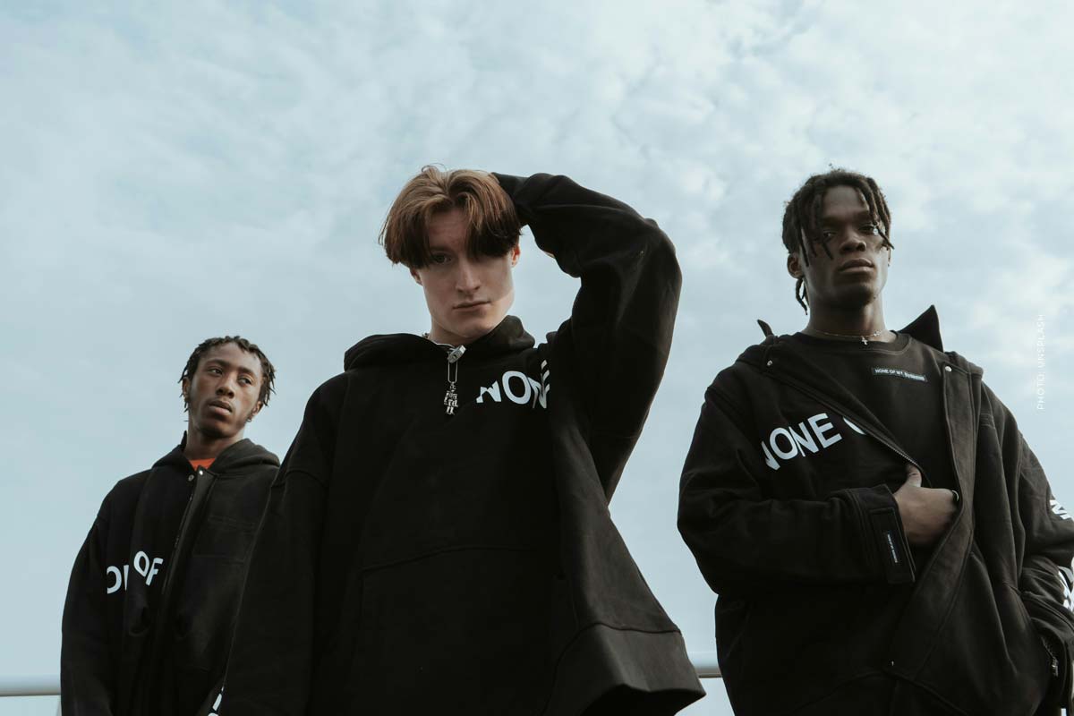 model-agency-management-young-models- black-dress-chain-sky-cloud-boys